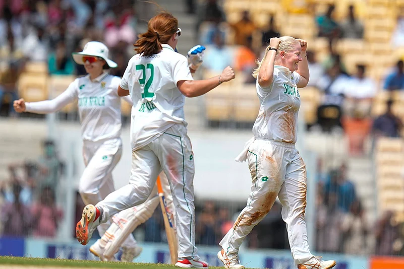 Delmi Tucker celebrates the wicket of Smriti Mandhana